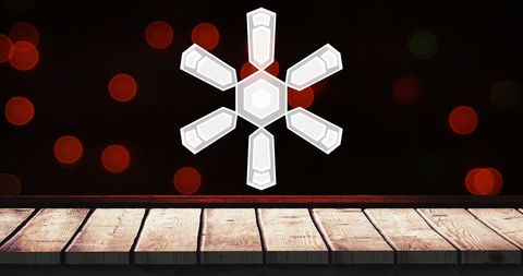 Digital Snowflake Overlay on Festive Red Bokeh Background