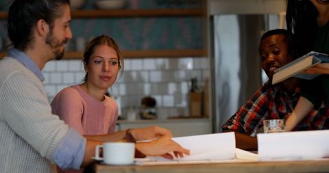 Diverse Team Collaborating on Project Design Details