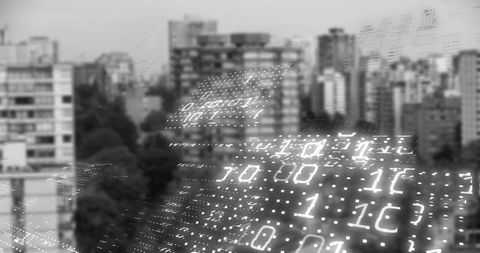 Glowing binary matrix overlaying urban skyline from above, grayscale futuristic city tech