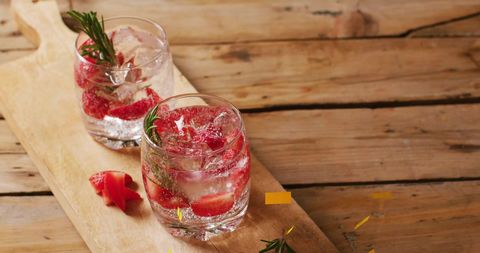 Refreshing Strawberry Rosemary Cocktails on Wooden Board - Download Free Stock Images Pikwizard.com