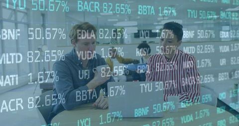 Business Professionals Analyzing Data with Overlaid Stock Market Ticker