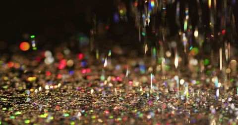 Colorful Glitter Falling with Sparkling Lights