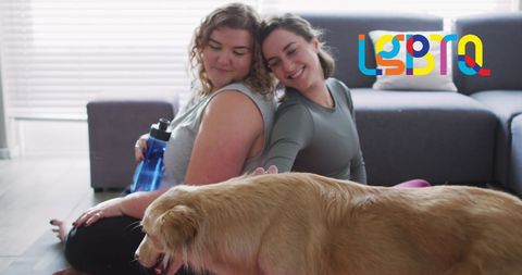 Loving LGBTQ Couple Petting Dog in Cozy Living Room - Download Free Stock Images Pikwizard.com