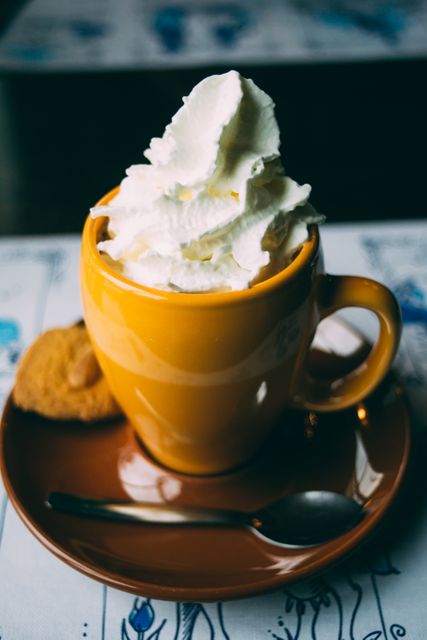 Yellow Mug with Whipped Cream and Cookie on Saucer - Download Free Stock Photos Pikwizard.com