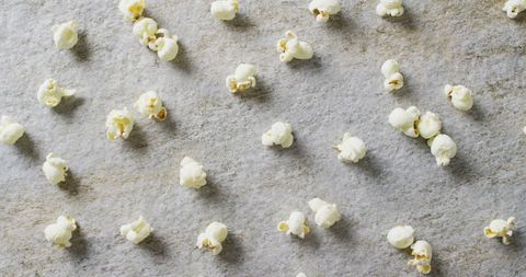 Scattered Popcorn on Gray Rustic Surface for Snack Background - Download Free Stock Images Pikwizard.com