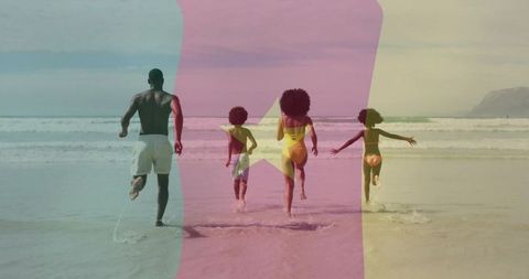 Family running into ocean at beach with color overlay stripes