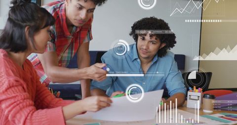 Diverse Business Team Analyzing Financial Data with Futuristic Graphics