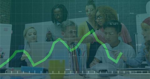 Diverse Team Analyzing Data with Graph Overlay in Office