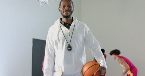 Basketball Coach Leading Team with Strategy and Skills