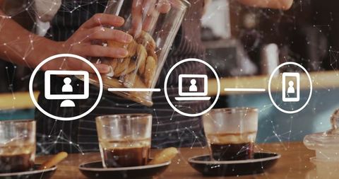 Barista Serving Cookies with Digital Technology Interface Lines