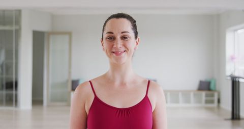 Smiling Ballet Dancer in Red Leotard at Studio - Download Free Stock Images Pikwizard.com