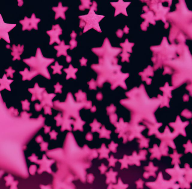 Floating pink stars creating a dreamy and festive atmosphere. Ideal for backgrounds, party invitations, holiday cards, or decorations. Provides a sense of celebration and mystique with vibrant and cosmic elements.