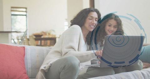Mother and daughter learning on laptop with digital privacy and security interface overlay