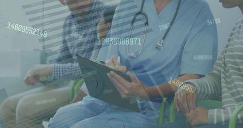 Healthcare professional analyzing data with patients