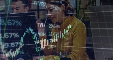 Young professionals analyzing stock market data with technology integration