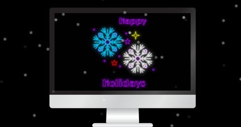 Festive holiday greeting on computer screen with snowfall background