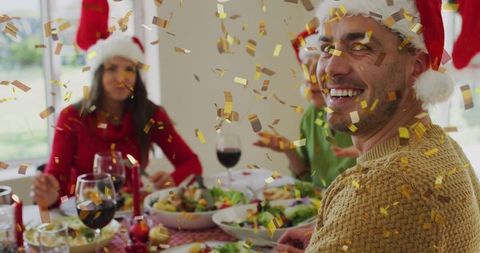 Joyful Holiday Gathering with Friends and Santa Hats