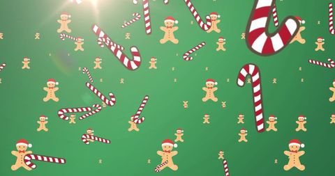 Festive Christmas Candy Canes and Gingerbread on Green