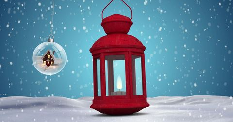 Red Lantern and Snowy Scenery with Christmas Ornament