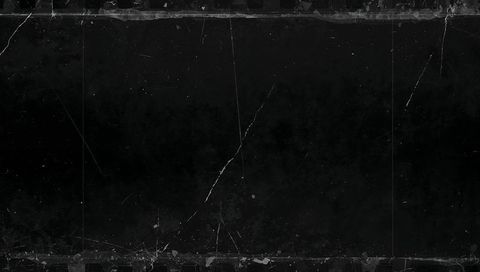 Scratched black film texture with torn sprocket edges and dusty grunge border overlay