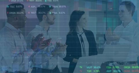 Business team applauding around laptop with stock ticker overlay in modern office