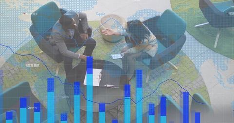 Business Meeting Analyzing Financial Data with Digital Overlay