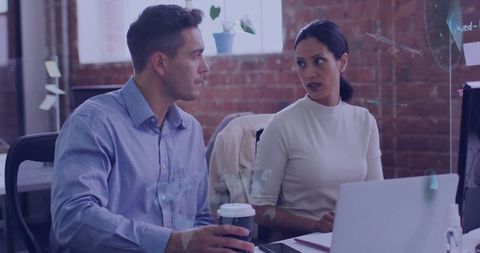 Business Colleagues Collaborating in Modern Office Setup