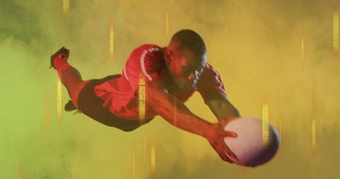 Dynamic athlete diving for rugby ball in vibrant studio setting