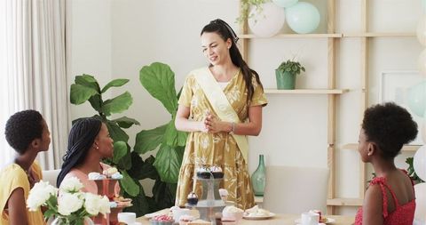 Woman Hosting a Relaxed Tea Party with Friends
