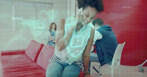 Smiling woman talking on phone in coworking lounge with augmented reality data overlay