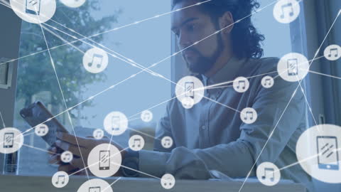 Young Man Interacting with Digital Network of Icons