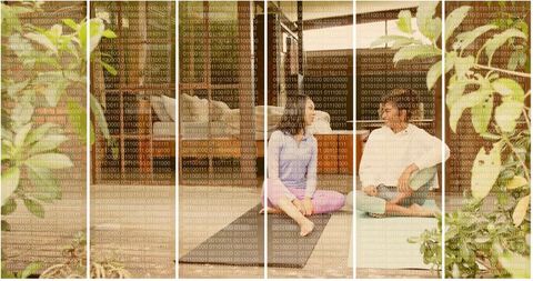 Sitting barefoot friends talking on sunlit veranda with binary code overlay, cozy sepia