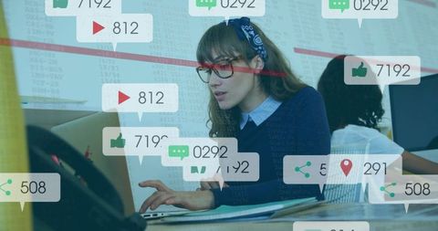 Professional Woman Analyzing Data on Laptop with Social Media Icons