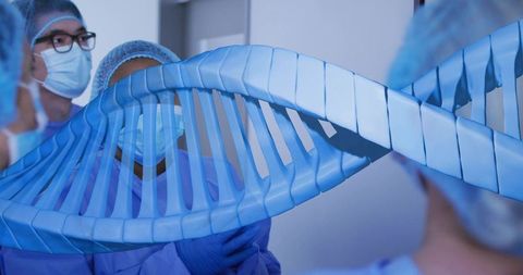 Medical team examining holographic dna helix for genomic research and diagnostics