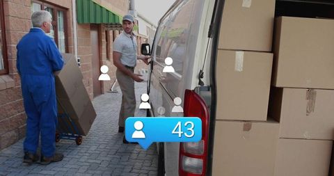 Delivery worker holding van door while team loading boxes in brick alley with social overlay