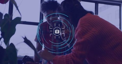 Mother and Son Collaborating on Photography in Home Studio