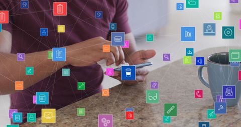 Man Sanitizing Smartphone Amid Digital Connectivity Icons - Download Free Stock Images Pikwizard.com