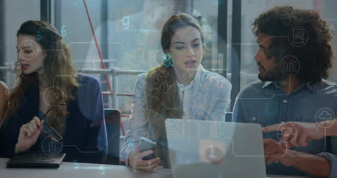 Team Analyzing Data with Digital Overlay in Modern Office