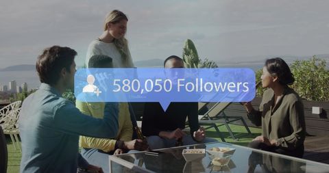 Diverse friends enjoying drinks with social media overlay