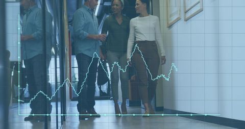 Business Professionals Discussing Amid Digital Financial Data Overlay