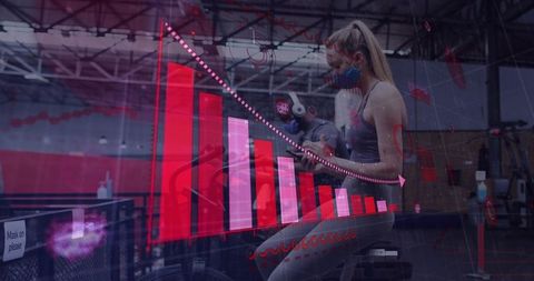 Masked woman pedaling stationary bike in gym with red declining bar chart and data overlay