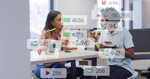 Coworkers chatting and eating lunch in modern office break area with social media overlays