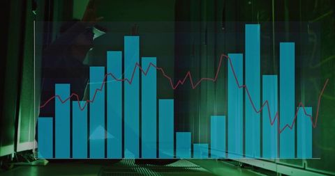 Technician Analyzing Server Data with Graph Overlay