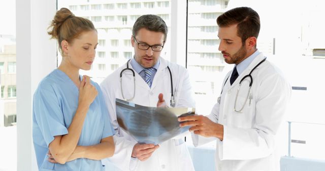 Medical team discussing xray at the hospital
