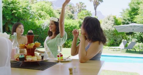 Bride-to-Be Enjoying Outdoor Bridal Shower with Friends