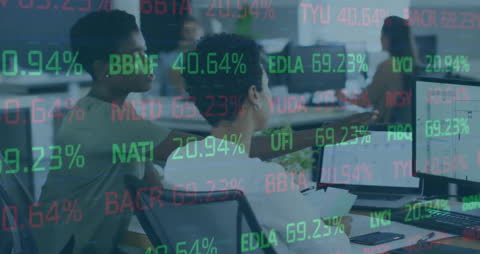 Office Team Evaluating Financial Data for Business Analysis