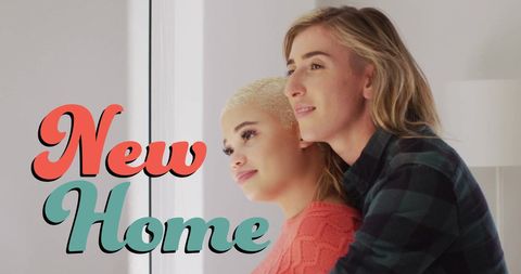 Lgbtq+ couple enjoying new home together