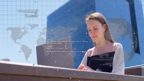 Woman Typing on Laptop with Map Overlay Indicating Software Productivity