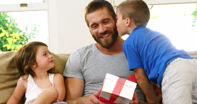 Children Giving Birthday Gift to Happy Father - Download Free Stock Images Pikwizard.com