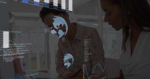 Two Women Collaborating on Data Dashboard, Analyzing Global Analytics in Modern Office